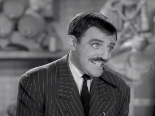 John Astin ในบท Gomez Addams จากซีรีส์ The Addams Family ค.ศ. 1964-1966 (พ.ศ. 2507-2509)