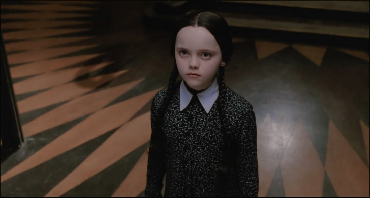 Christina Ricci ในบท Wednesday Addams จากหนัง ภาพยนตร์ The Addams Family ค.ศ. 1991 (พ.ศ. 2534)