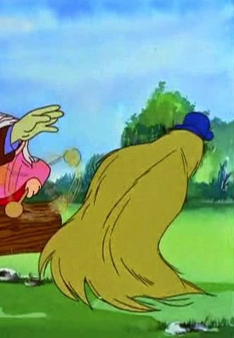 Cousin Itt จากการ์ตูน The Addams Family ค.ศ. 1973 (พ.ศ. 2516) ให้เสียงพากย์โดย John Stephenson