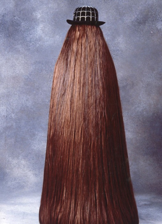 John Franklin ในบท Cousin Itt จากหนัง ภาพยนตร์ The Addams Family ค.ศ. 1991 (พ.ศ. 2534)